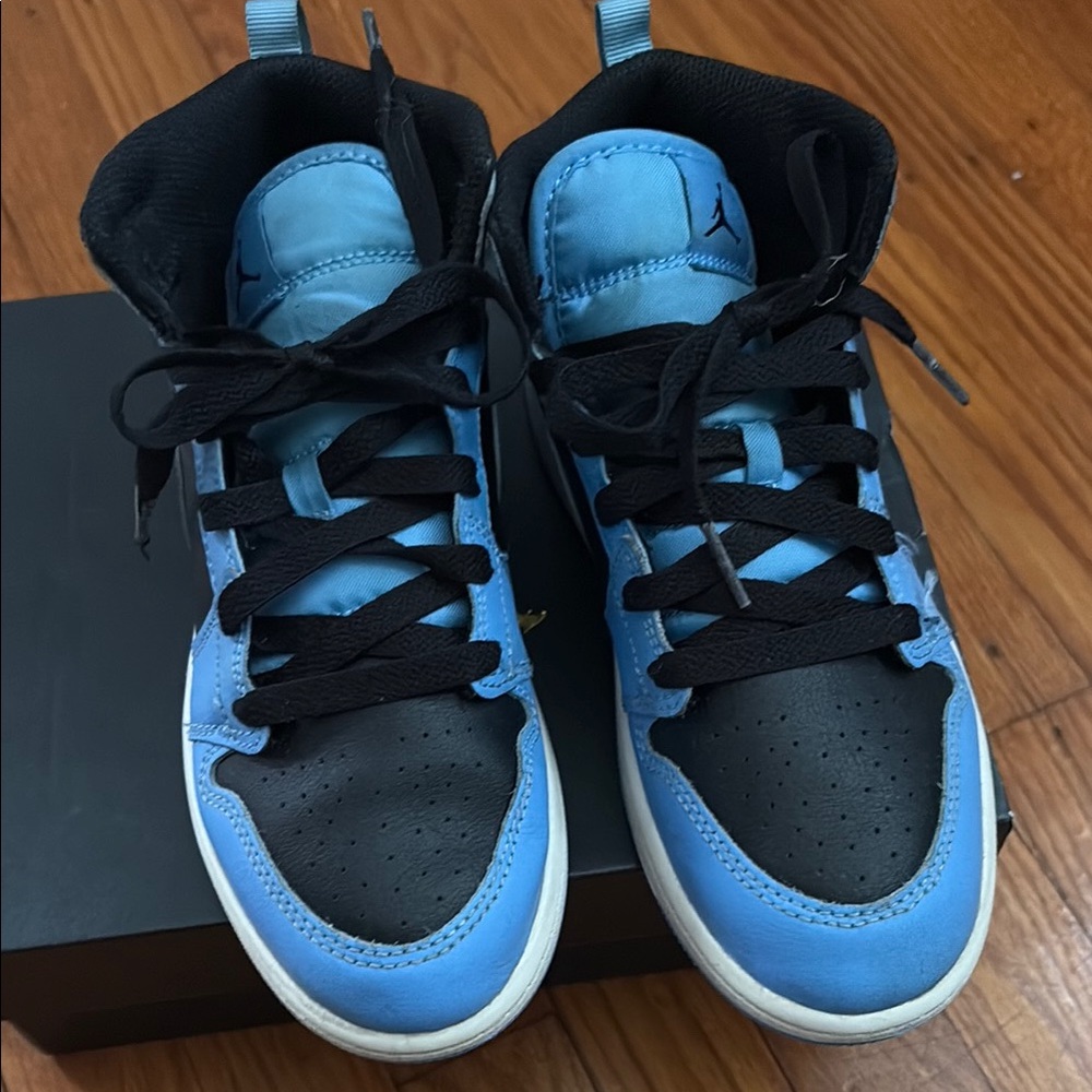 Nike Blue and Black High-Top Sneakers with Classic Design